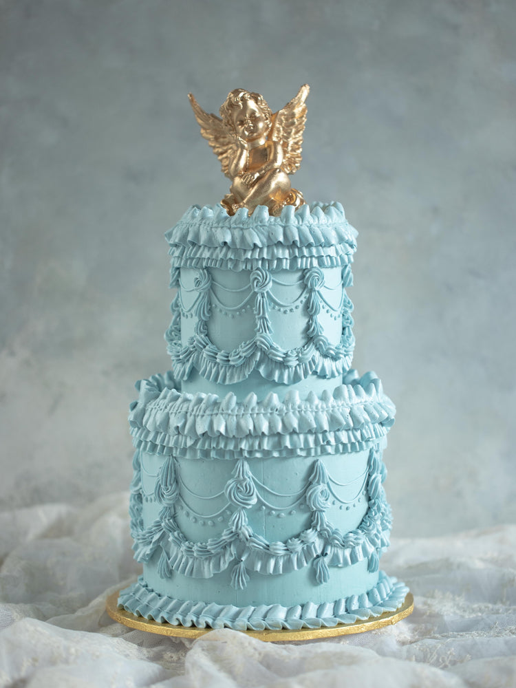 two tier baroque vintage buttercream birthday cake Singapore with gold chocolate angel topper