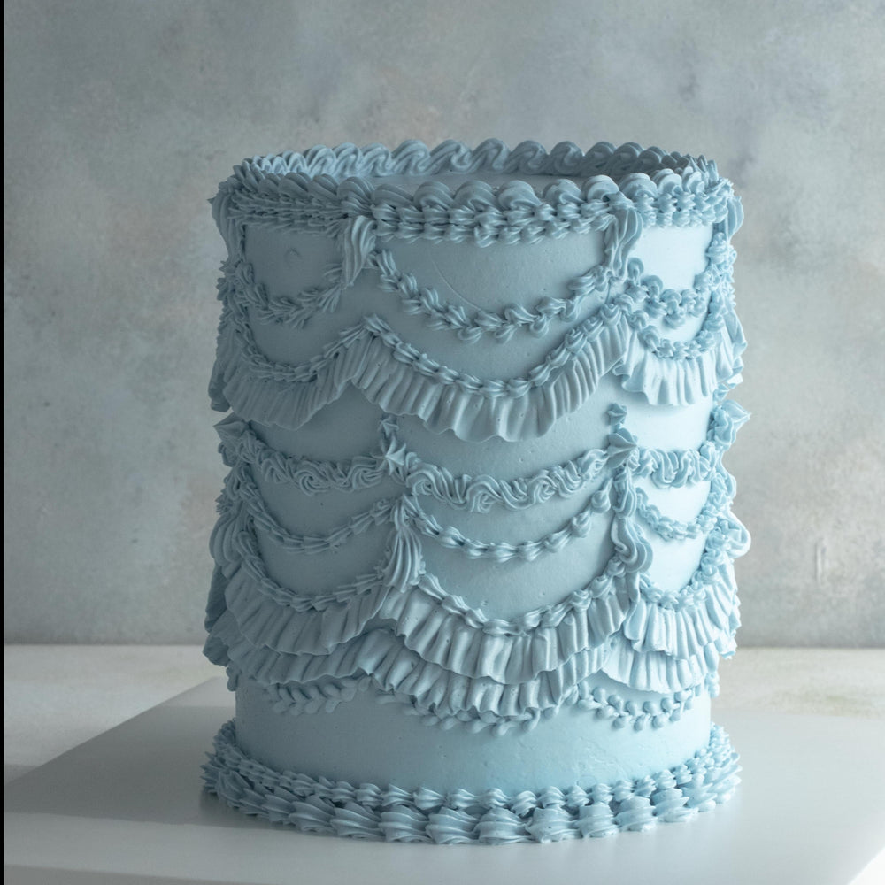 Dusty blue vintage buttercream birthday cake for celebrations in Singapore