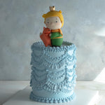 Dusty blue vintage buttercream cake for Singapore birthday parties, with a Little Prince fondant topper
